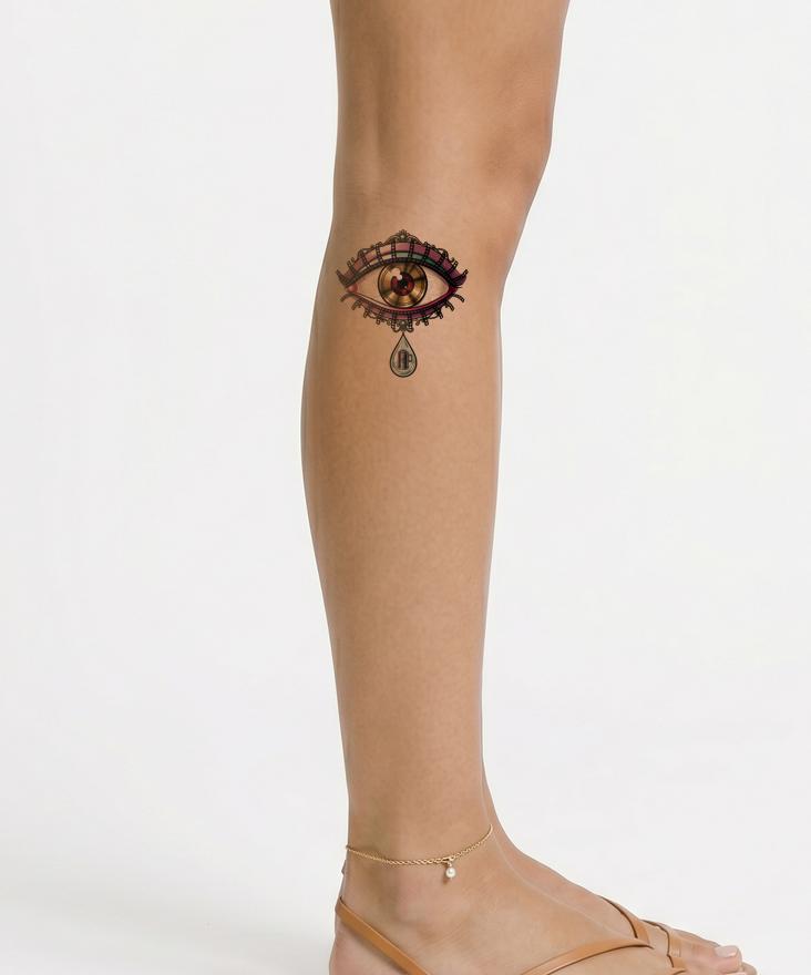 Surreal Eye Lens Tattoo Design