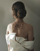girl with a beautiful back tattoo of a flower