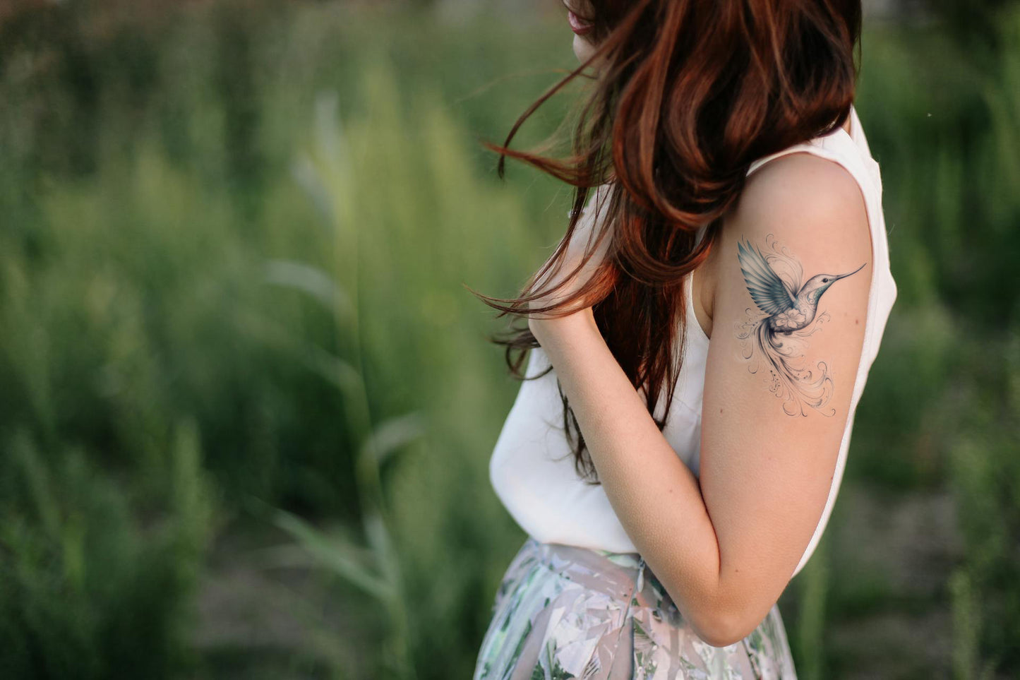 Delicate Hummingbird Tattoo Design