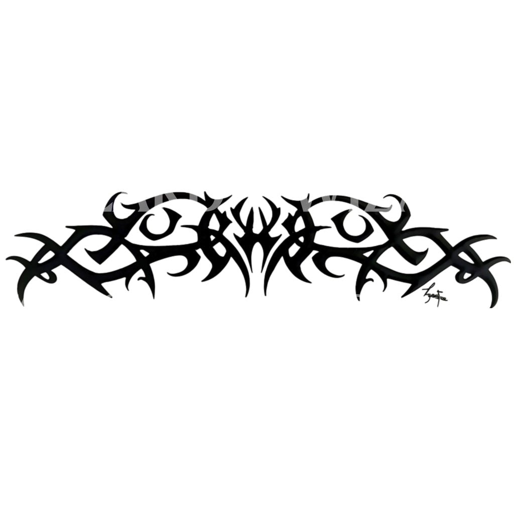 Barbed Tribal Pattern with Eye Motif Tattoo Idea