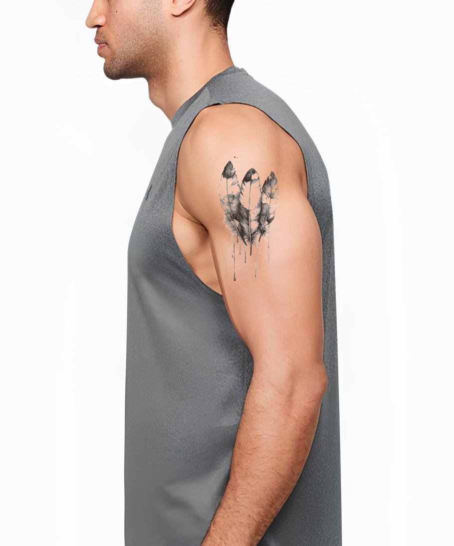 Dripping Feather Trio Tattoo Idea