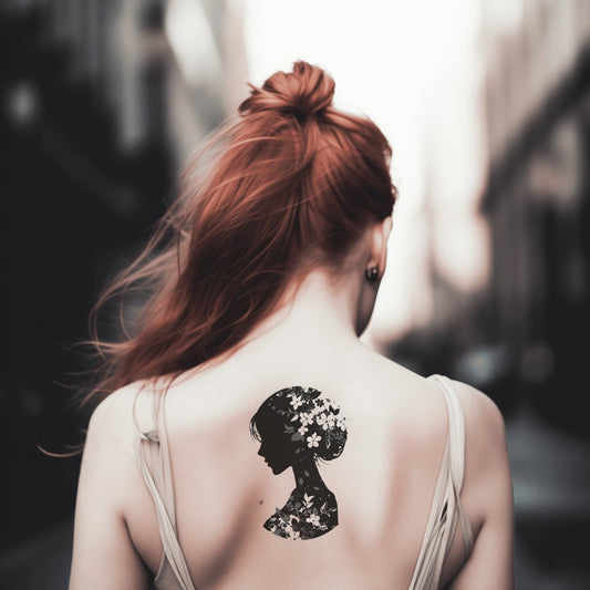 Design de tatouage portrait silhouette florale