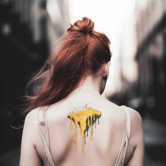 Desain Tato Tetes Emas Cair