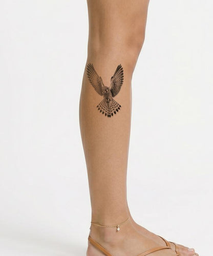 Hovering Kestrel Falcon Tattoo Design