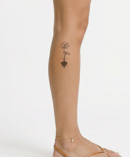 Graphite Lotus with Stem Reaching into the Mud Tattoo Idea