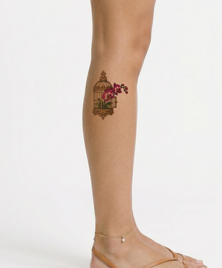 Orchid Escaping Golden Birdcage Tattoo Design