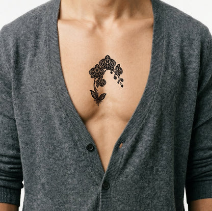Blackwork-tatovering av orkidé i blondebue