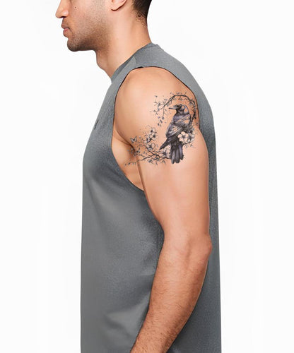 Rabe auf Kirschblütenzweig Tattoo Design