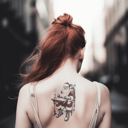 Santa Relaxing with Book Tattoo Design