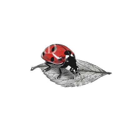 Small Ladybug and Leaf Tattoo Design