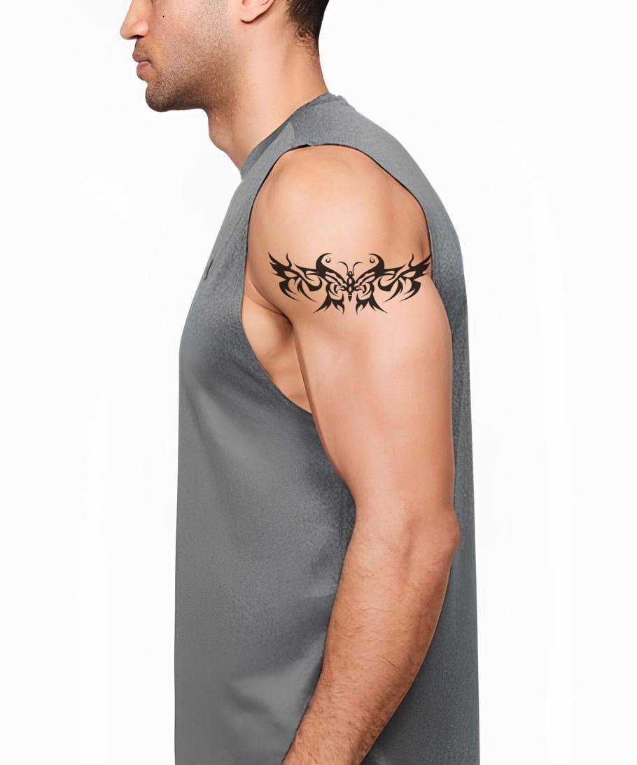 Symmetrical Tribal Design with Butterfly Wings Tattoo Idea