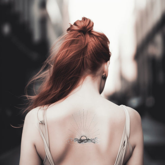 Tiny Sun over Clouds Tattoo Idea